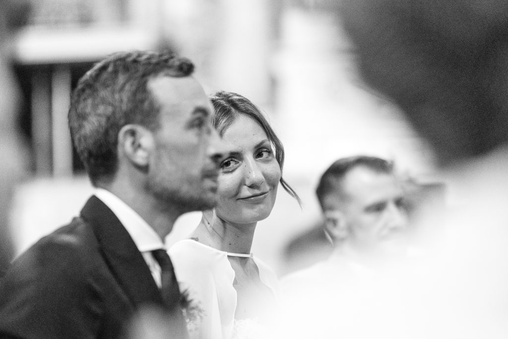 a man and woman looking at each other